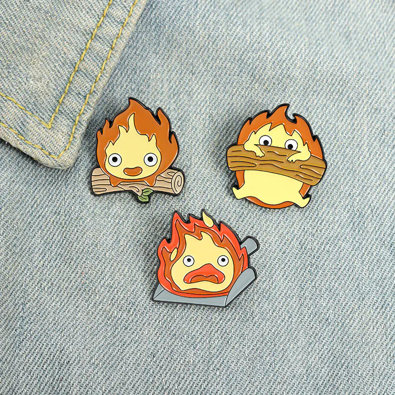 Broches/Pins creativos de madera, fuego y dibujos animados