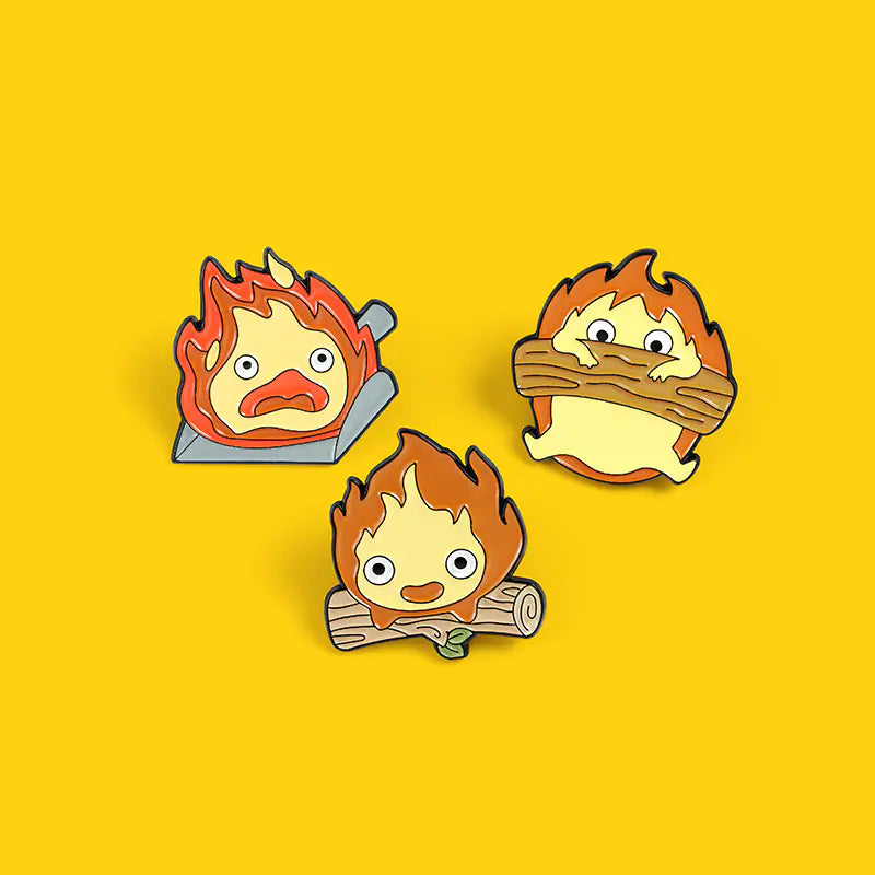 Broches/Pins creativos de madera, fuego y dibujos animados