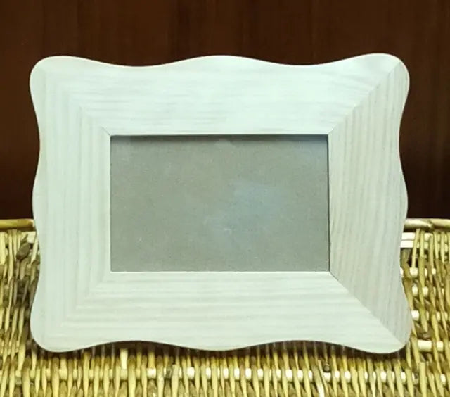 إطار صور بتصميم أمواج عتيق