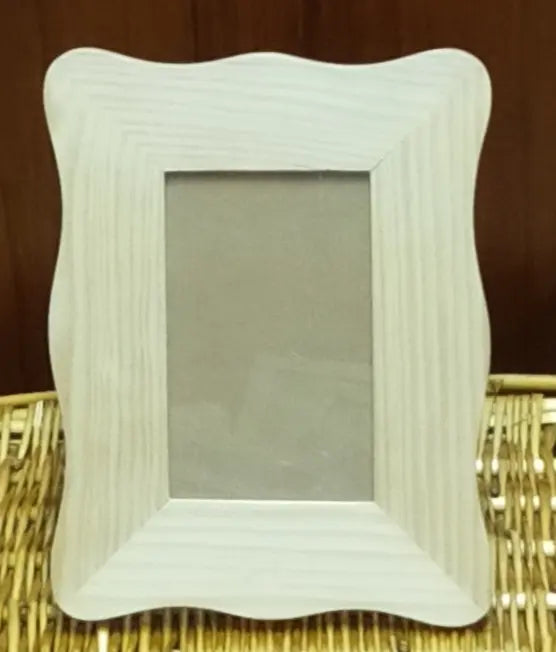 إطار صور بتصميم أمواج عتيق