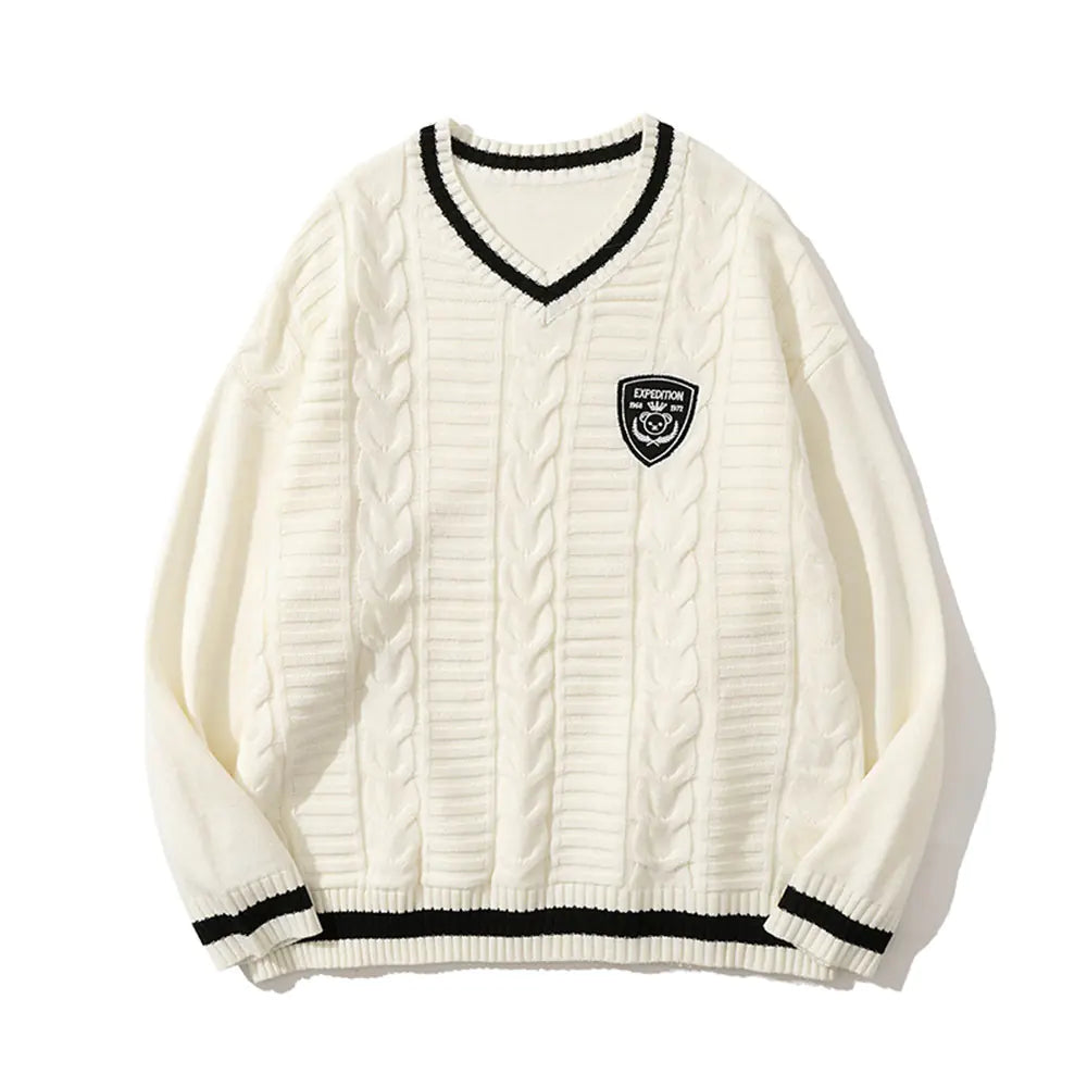 كنزة فضفاضة بياقة على شكل حرف V مناسبة لفصل الخريف، تتماشى مع أحدث صيحات الموضة.